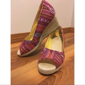 Tribal print red and yellow wedges.